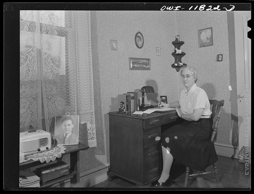 Lititz, Pennsylvania. Mrs. Viola Marvel in her apartment. She has a son in the U.S. Army and spends most of her spare time writing to him and to an older friend in the U.S. Navy. Her hobbies are reading poetry and analysing handwriting