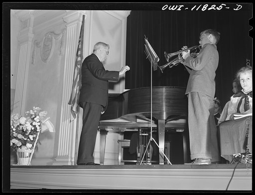 Lititz, Pennsylvania. Benny Lutz conducting trumpet players in one of his own compositions at a junior choir performance in the Moravian Sunday school