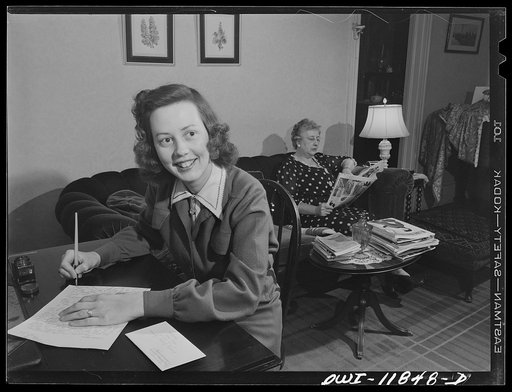 Untitled photo, possibly related to: Lititz, Pennsylvania. Mrs. Julian Bachman, twenty-three, has been married a year. Her husband is in Officers' Candidate School of the U.S. Army Air Corps in Kentucky, so she is living at home and works at the Animal Trap Company from 7 to 4. She spends her evenin