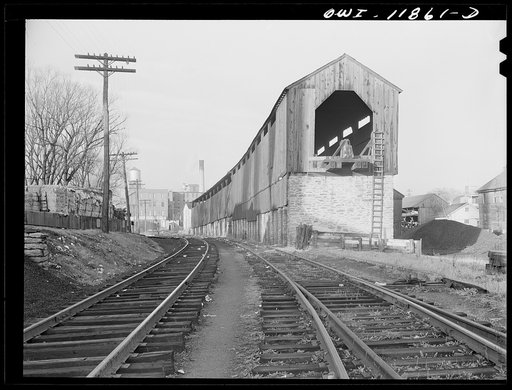Lititz, Pennsylvania. Tracks of the Lanaster-Reading Railroad. Two trains come through every day. In the distance is the local chocolate factory