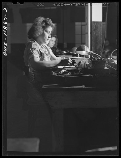 Untitled photo, possibly related to: Lititz, Pennsylvania. Hands of Mrs. Julian Bachman, a gauge inspector at the Animal Trap Company of America