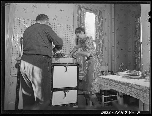 Neffsville, Pennsylvania. Mr. and Mrs. Earle Landis turn over their Thanksgiving turkey