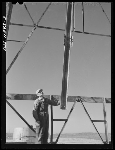 Untitled photo, possibly related to: Andrews County, Texas. Derrick builders at lunch