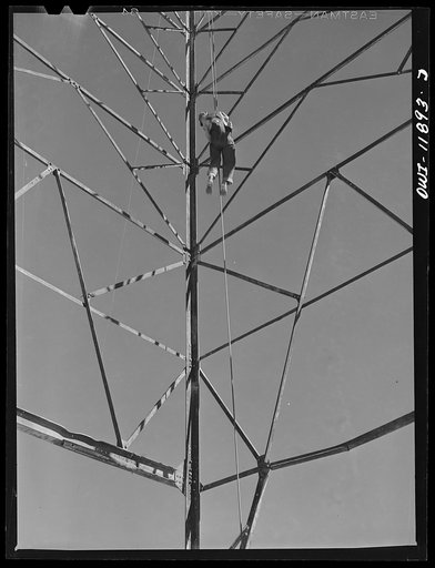 Andrews County, Texas. Member of a derrick building crew coming down for lunch