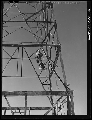 Untitled photo, possibly related to: Andrews County, Texas. Mixing mud to be used in drilling operations