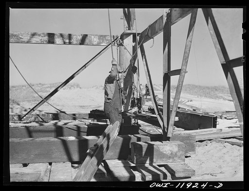 Untitled photo, possibly related to: Andrews County, Texas. Derrick builders at lunch