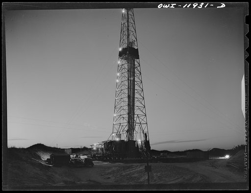 Andrews County, Texas. Drilling operations at night. All oil well drilling goes on twenty-four hours a day