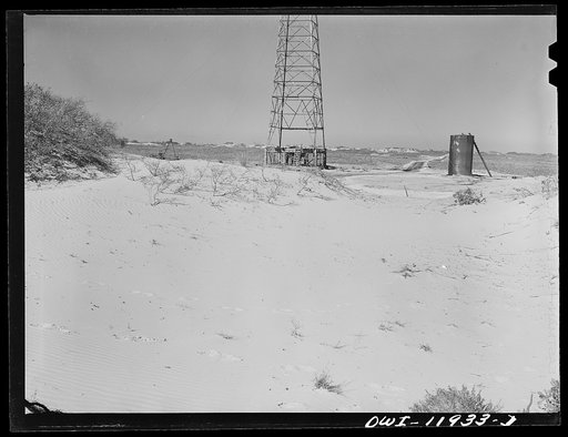 Untitled photo, possibly related to: Andrews County, Texas. Bringing pipeline to new oil well