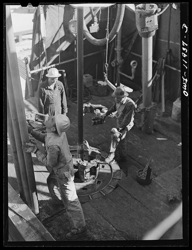 Untitled photo, possibly related to: Andrews County, Texas. Bit at end of drill pipe. In going through hard structures these bits sometimes wear out in three or four hours
