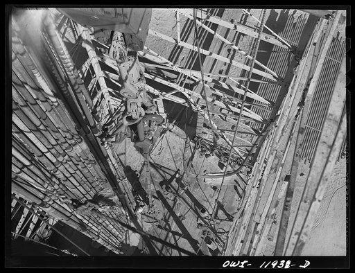 Andrews County, Texas. Looking down from top of derrick during drilling operations