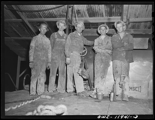 Andrews County, Texas. Driller and roughnecks on night tour