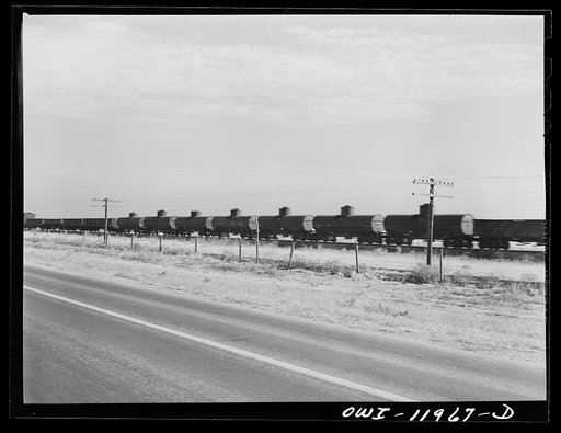 Untitled photo, possibly related to: Deaf Smith County, Texas. Train going across the Texas purchase