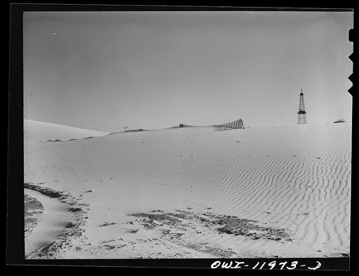 Andrews County, Texas. Oil well in sand hills country