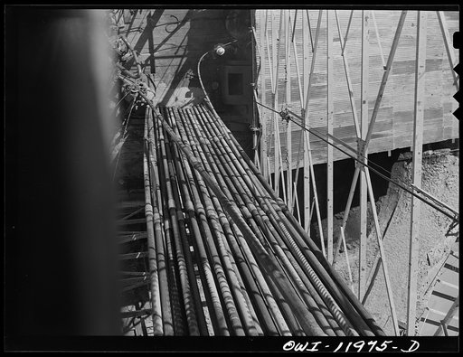 Untitled photo, possibly related to: Andrews County, Texas. Looking down from the top of a derrick during drilling operation