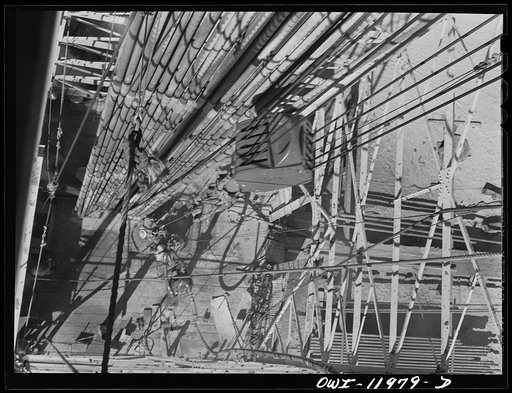 Untitled photo, possibly related to: Andrews County, Texas. Looking down from the top of a derrick during drilling operation