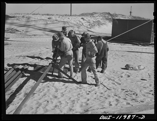 Untitled photo, possibly related to: Andrews County, Texas. Bringing pipelines to new oil line