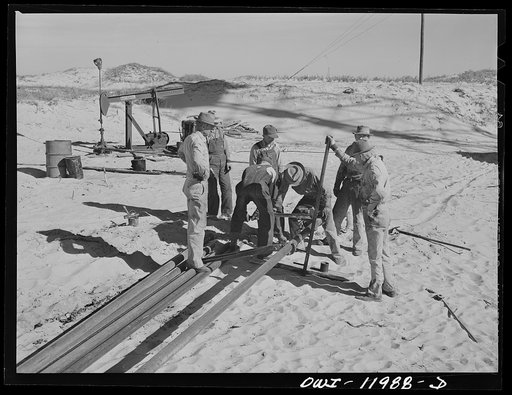 Andrews County, Texas. Bringing pipelines to new oil line