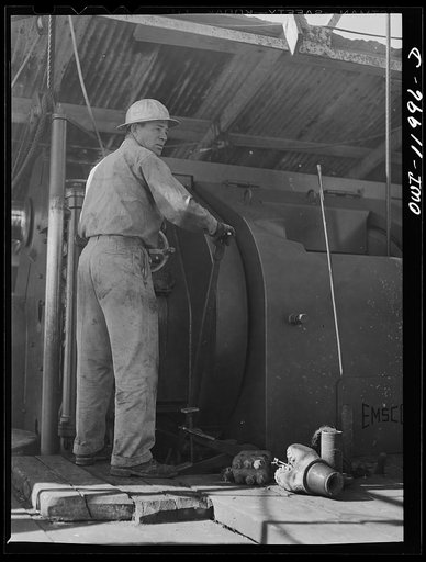Andrews County, Texas. Driller at work
