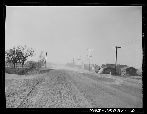 Portales, New Mexico. Dust blowing on the street