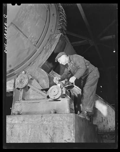 Pittsburgh, Pennsylvania (vicinity). Champion no. 1 coal cleaning plant. Oiling the gears of the huge drums that dry the coal after washing
