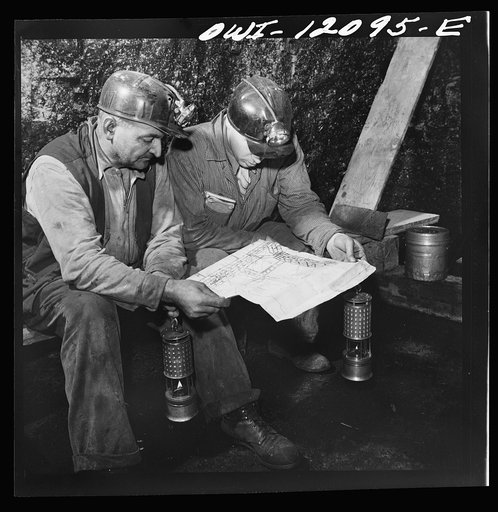 Pittsburgh, Pennsylvania (vicinity). Montour no. 4 mine of the Pittsburgh Coal Company. Section foreman and assistant mine superintendent checking off the days of work