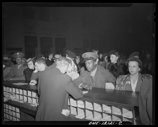 Washington, D.C. Soldiers and civilians purchasing tickets at the Union Station