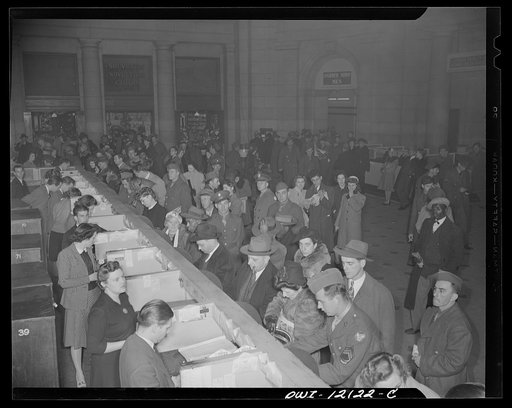Washington, D.C. Soldiers and civilians purchasing tickets at the Union Station
