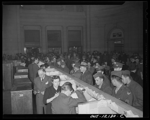 Washington, D.C. Soldiers and civilians purchasing tickets at the Union Station
