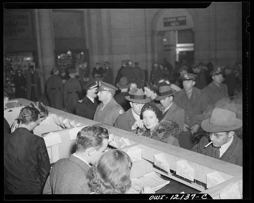 Untitled photo, possibly related to: Washington, D.C. Soldiers and civilians purchasing tickets at the Union Station