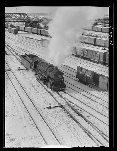 Chicago, Illinois. Locomotive used for switching purposes at a Chicago and Northwestern Railroad yard