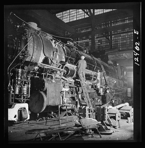 Chicago, Illinois. A locomotive of the 2000 class being repaired at the Chicago and Northwestern Railroad locomotive shops