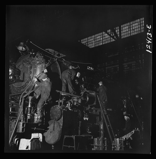 Untitled photo, possibly related to: Chicago, Illinois. Locomotive under repair at the Chicago and Northwestern Railroad shops