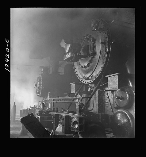 Untitled photo, possibly related to: Chicago, Illinois. Locomotive under repair at the Chicago and Northwestern Railroad shops