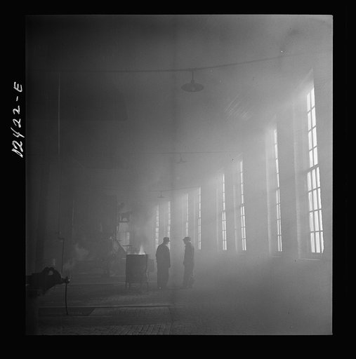 Untitled photo, possibly related to: Chicago, Illinois. In the roundhouse at a Chicago and Northwestern Railroad yard
