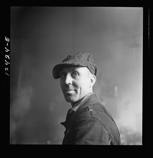 Untitled photo, possibly related to: Chicago, Illinois. In the roundhouse at a Chicago and Northwestern Railroad yard