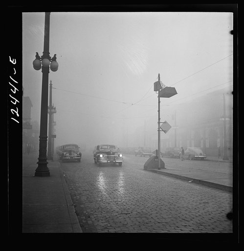 Untitled photo, possibly related to: Chicago, Illinois. An unusually heavy fog in the early afternoon