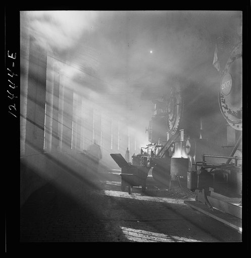 Untitled photo, possibly related to: Chicago, Illinois. In the roundhouse at a Chicago and Northwestern Railroad yard