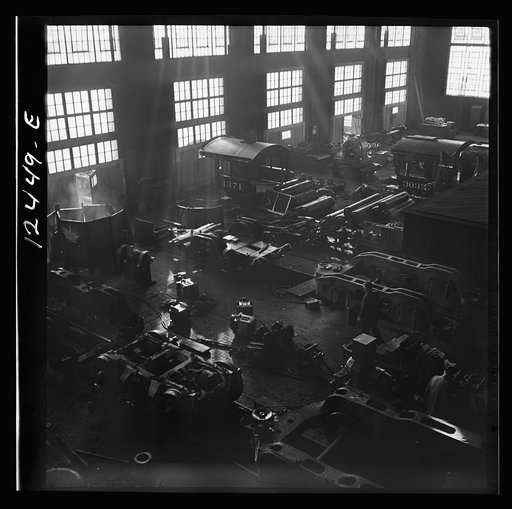 Untitled photo, possibly related to: Chicago, Illinois. In the Chicago and Northwestern Railroad locomotive repair shop