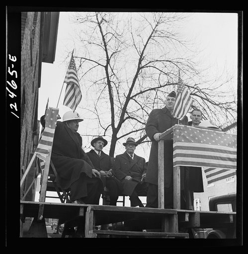 Chicago (north), Illinois. Speakers at a neighborhood flag dedication ceremony