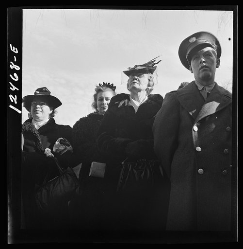 Chicago (north), Illinois. People listening to speakers at a flag dedication ceremony