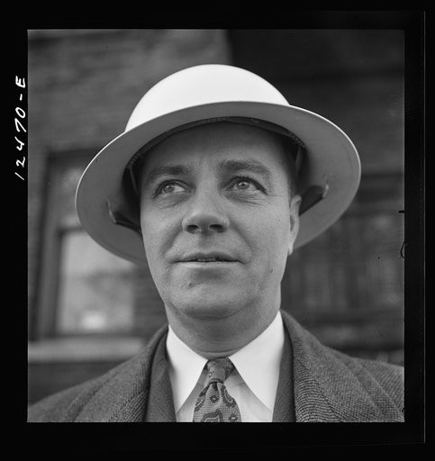 Chicago (north), Illinois. Mr. J.A. Brown, air raid warden in his block and participant in the neighborhood flag dedication ceremony