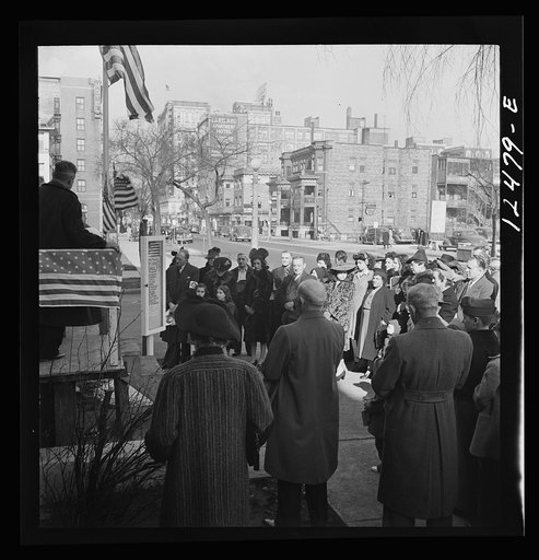 Chicago (north), Illinois. People listening to speakers at a flag dedication ceremony