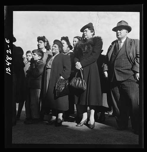 Chicago (north), Illinois. People listening to speakers at a flag dedication ceremony