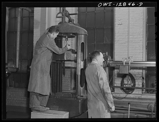Untitled photo, possibly related to: Chicago, Illinois. In this machine at the laboratory of the Chicago and Northwestern Railroad various paints, preservatives and other coatings used on railroad equipment are put through severe tests
