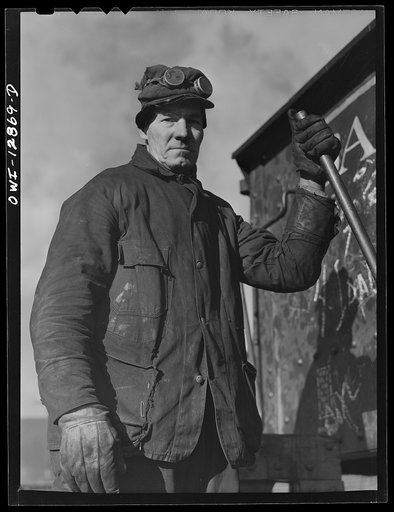 Chicago, Illinois. Worker who is employed at the rip tracks of the Chicago and Northwestern Railroad