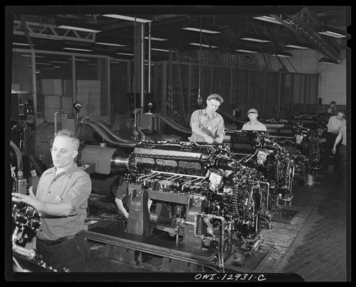 Detroit, Michigan. Assembly of Rolls Royce engines at the Packard motor car company. Flush-in stands