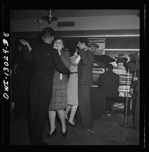 New York, New York. Merchant seamen's Christmas party at the Andrew Feruseth Club on Christmas Day. Dancing with hostesses