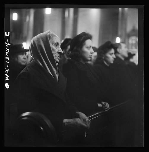 New York, New York. Midnight mass on Christmas Eve at Saint Dominick's church in an Italian-American neighborhood