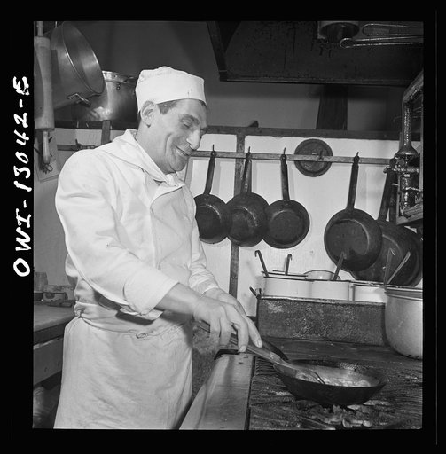 New York, New York. Chef in Marconi's Restaurant on Mulberry Street preparing New Year's dinner for the Di Costanzo family, the owners
