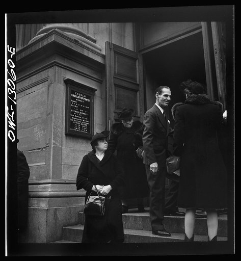 New York, New York. Italian-Americans leaving the church of Our Lady of Pompeii at Bleecker and Carmine Streets, on New Year's Day